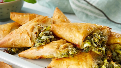 Cheesy Pesto Zucchini Triangles